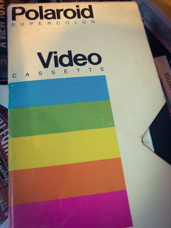 A Polaroid recordable VHS tape with rainbow stripes.